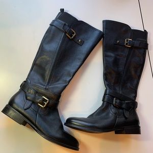 black leather boots with buckles and small heal